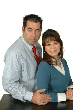 A man and a woman posing for a picture